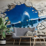 Fototapet Jet izbucnește prin peretele crăpat.