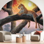 Fototapet Leopard întins pe copac la apus.