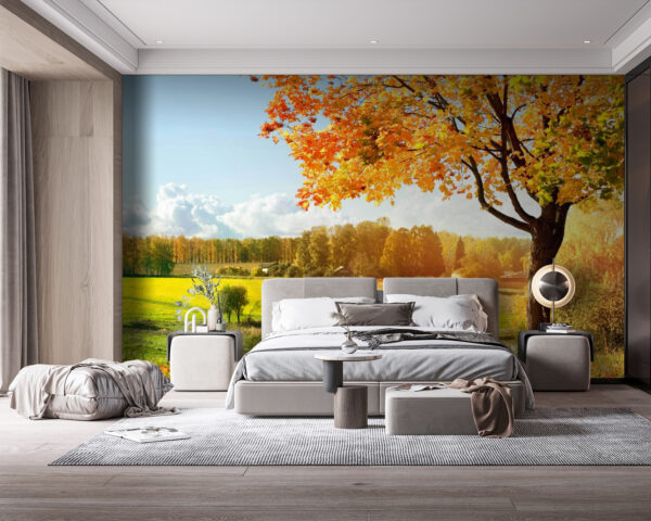 Fototapet Copac cu frunze portocalii pe un câmp