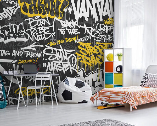 Graffiti galben pe un fundal negru Fototapet Graffiti galben pe un fundal negru