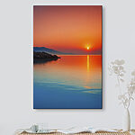 Tablouri Canvas prints Sunset over a body of water