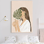 Tablouri Femeie care ține o frunză