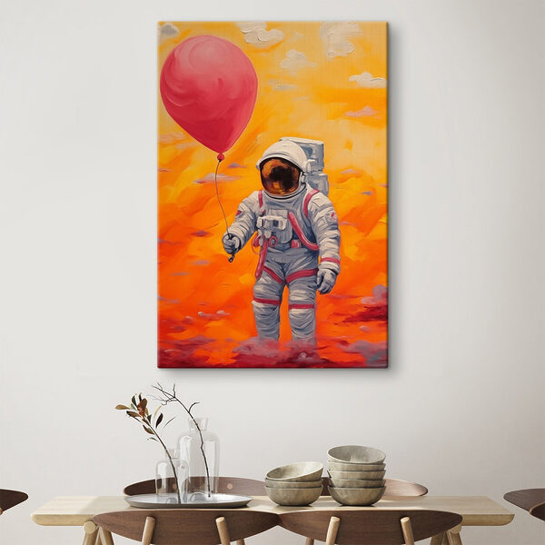 Un astronaut care ține un balon Tablouri Un astronaut care ține un balon