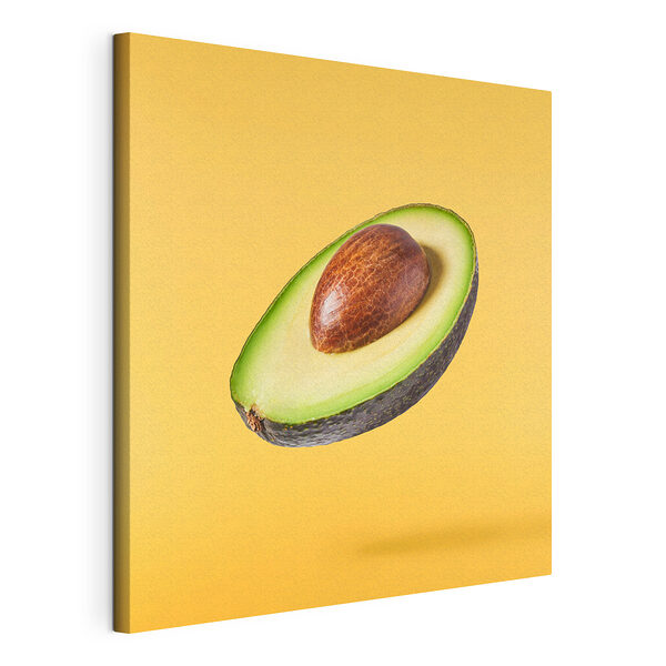Tablou pe pânză Un avocado tăiat în jumătate