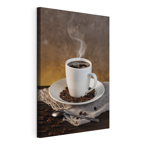Tablou pe pânză Ceașcă de cafea pe o farfurie cu boabe de cafea