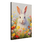 Tablou pe pânză Iepure alb într-un câmp de flori