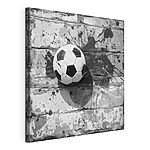 Tablou pe pânză Minge de fotbal pe un fundal pictat